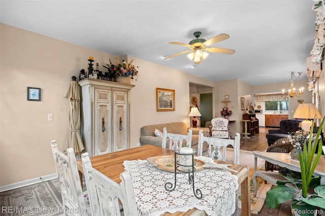 4044 Fieldview Ave, West Bloomfield, MI 48324 - living area featuring ceiling fan and a chandelier
