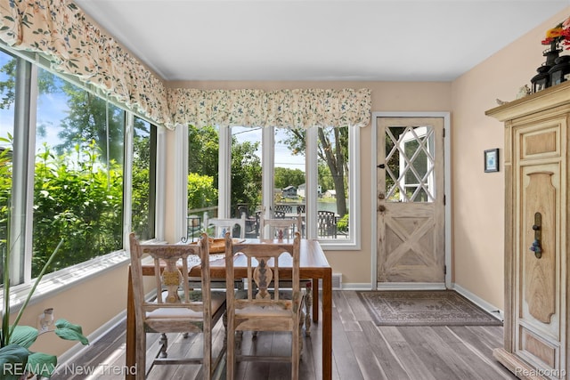 4044 Fieldview Ave, West Bloomfield, MI 48324 - dining area with healthy amount of natural light, wood finished floors, and baseboards