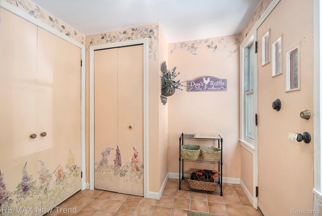 4044 Fieldview Ave, West Bloomfield, MI 48324 - foyer entrance with light tile patterned flooring and baseboards