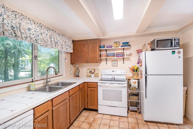 4044 Fieldview Ave, West Bloomfield, MI 48324 - kitchen featuring white appliances, a sink, light tile patterned floors, brown cabinets, and ornamental molding