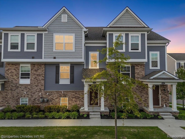 4953 Treeside Ln, Troy, MI 48098 - view of front facade featuring brick siding