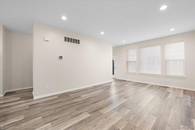 4953 Treeside Ln, Troy, MI 48098 - spare room with light wood finished floors and recessed lighting