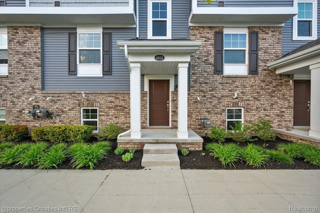 4953 Treeside Ln, Troy, MI 48098 - property entrance featuring brick siding
