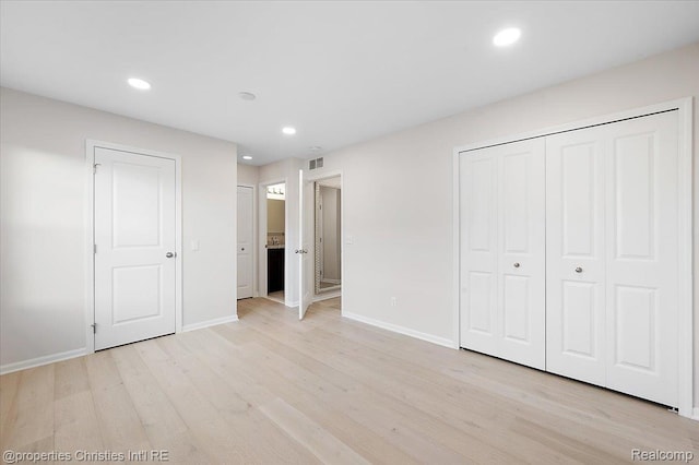 4953 Treeside Ln, Troy, MI 48098 - unfurnished bedroom featuring light wood-style flooring and recessed lighting