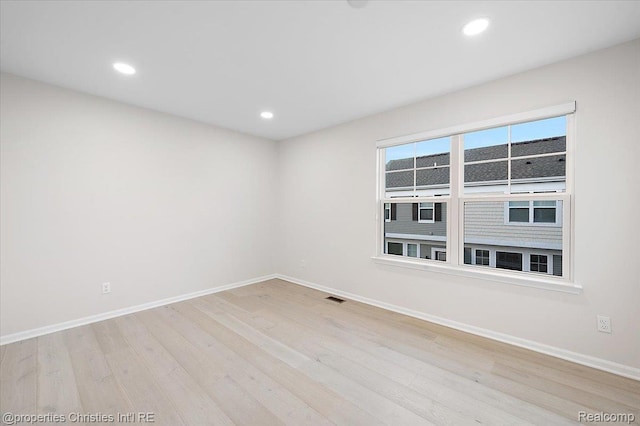 4953 Treeside Ln, Troy, MI 48098 - unfurnished room featuring wood finished floors and recessed lighting