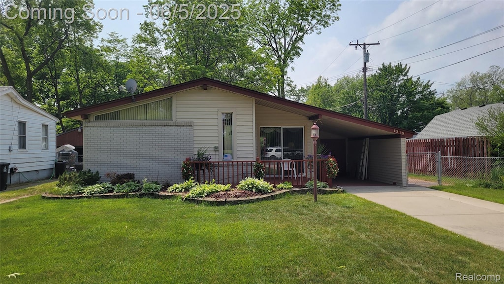 1318 S Linville Ave, Westland, MI 48186 - view of front facade with driveway, an attached carport, and central AC unit