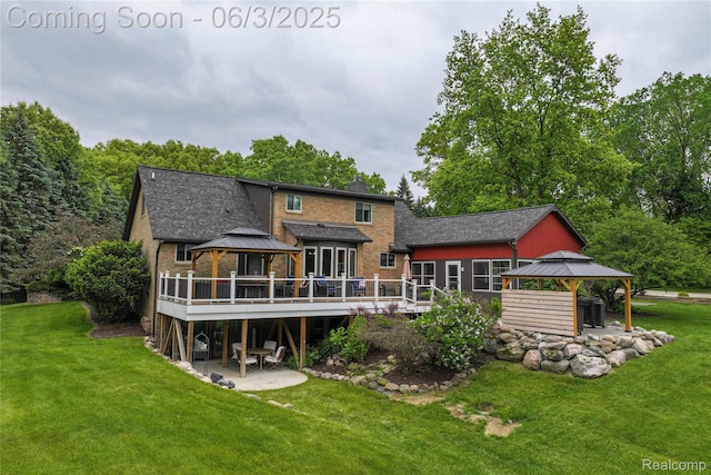 490 Rolling Oaks Dr, Howell, MI 48843 - back of property with a gazebo, a patio, and brick siding