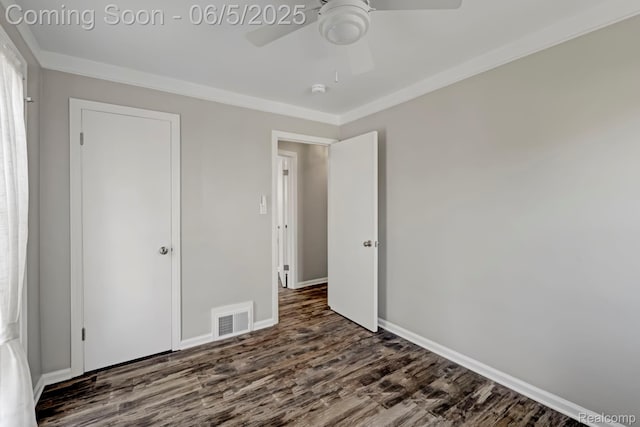 2231 Parker St, Dearborn, MI 48124 - unfurnished bedroom with dark wood-style flooring, baseboards, ornamental molding, and a ceiling fan