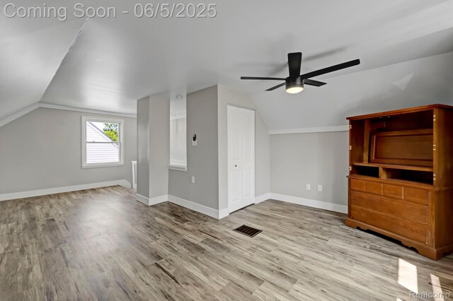 2231 Parker St, Dearborn, MI 48124 - additional living space featuring ceiling fan, vaulted ceiling, wood finished floors, and baseboards