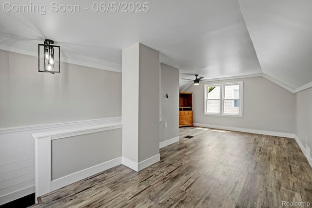 2231 Parker St, Dearborn, MI 48124 - bonus room featuring vaulted ceiling, wood finished floors, a ceiling fan, and baseboards