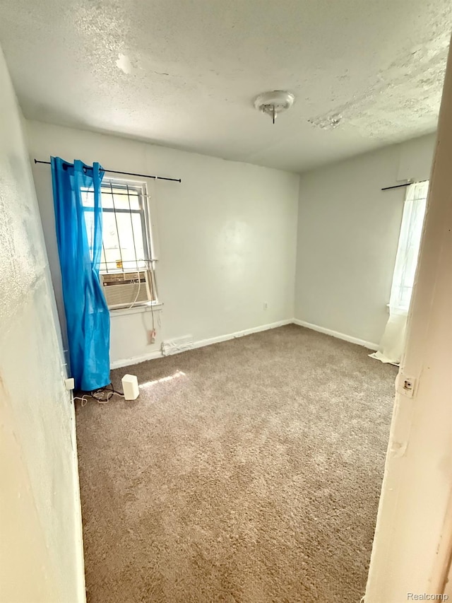 17469 Goddard St, Detroit, MI 48212 - empty room featuring carpet flooring, a textured ceiling, and baseboards