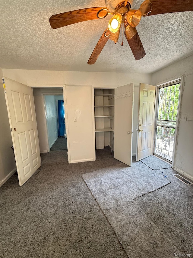 17469 Goddard St, Detroit, MI 48212 - unfurnished bedroom with carpet floors, a textured ceiling, ceiling fan, access to outside, and baseboards