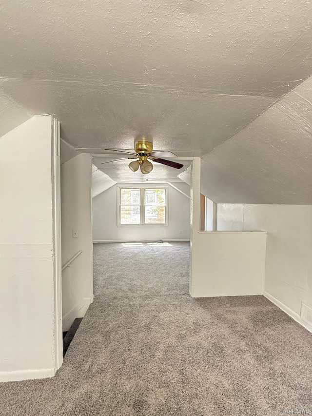 17469 Goddard St, Detroit, MI 48212 - additional living space with carpet flooring, a textured ceiling, vaulted ceiling, and a ceiling fan
