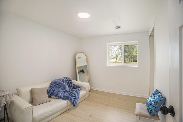 2635 E River Rd, Twin Lake, MI 49457 - living area featuring light wood-style floors and baseboards