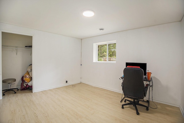 2635 E River Rd, Twin Lake, MI 49457 - unfurnished office with wood finished floors and baseboards