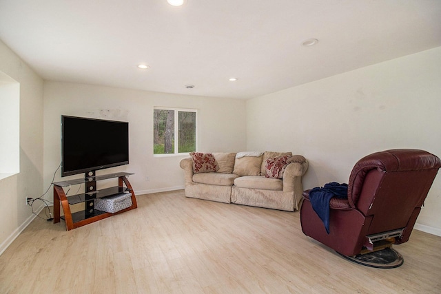 2635 E River Rd, Twin Lake, MI 49457 - living area featuring wood finished floors, baseboards, and recessed lighting