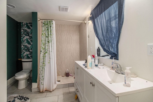 2635 E River Rd, Twin Lake, MI 49457 - full bathroom featuring a stall shower, toilet, vanity, and tile patterned floors