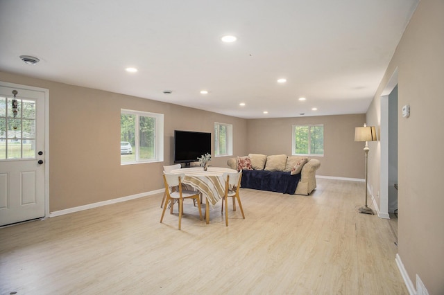 2635 E River Rd, Twin Lake, MI 49457 - living room with light wood-style floors, baseboards, and recessed lighting