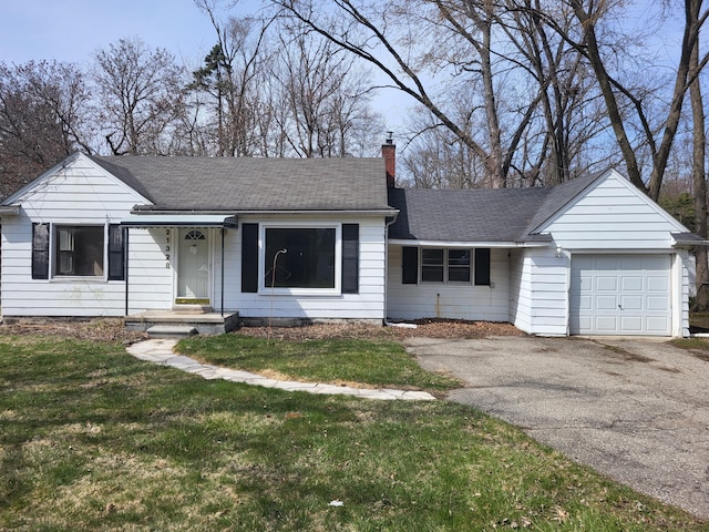 21328 Frazer Ave, Southfield, MI 48075 - ranch-style home featuring an attached garage, a chimney, driveway, and a front lawn