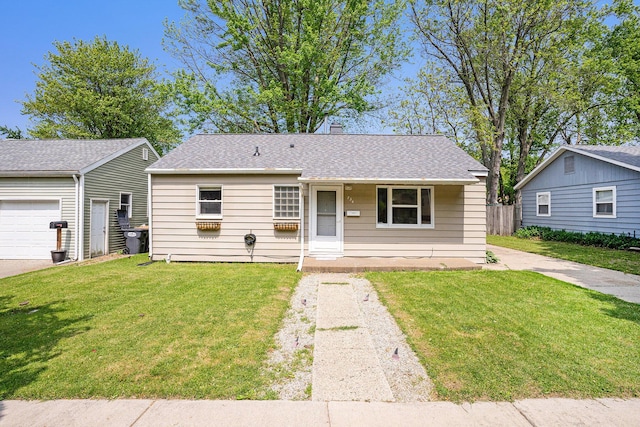 734 Hiways Ave, South Haven, MI 49090 - view of front of property with a front lawn, covered porch, and driveway
