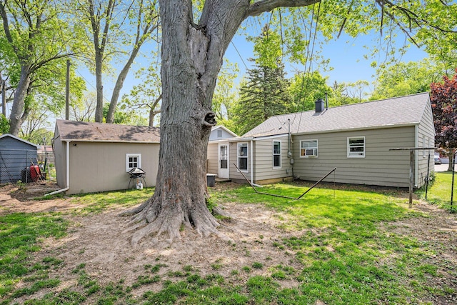 734 Hiways Ave, South Haven, MI 49090 - back of house with a shingled roof
