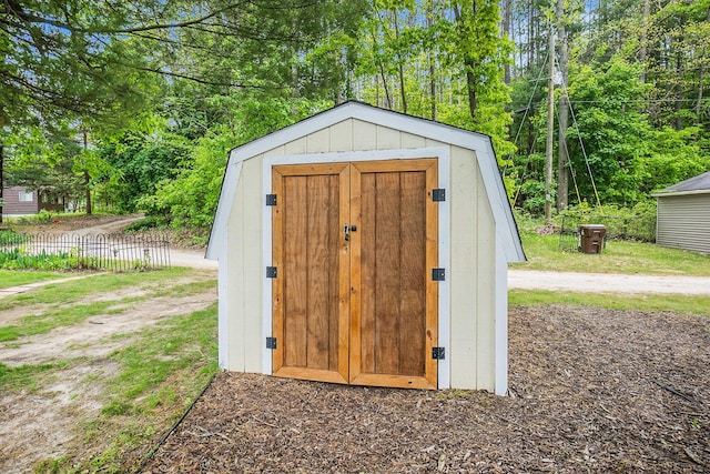 6026 Keeney Rd, Six Lakes, MI 48886 - view of shed featuring view of scattered trees