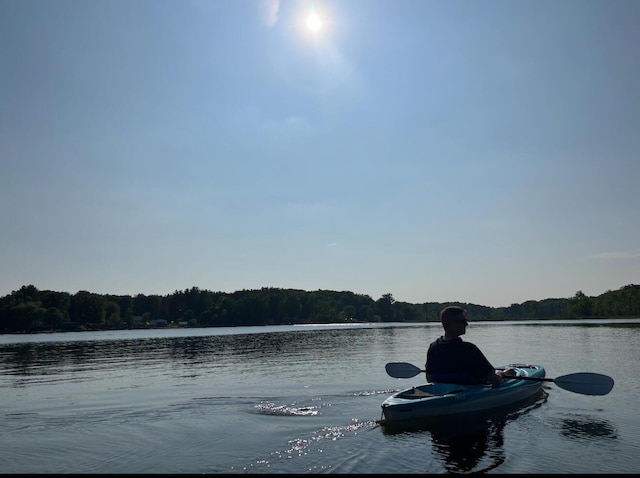 6026 Keeney Rd, Six Lakes, MI 48886 - water view with a forest