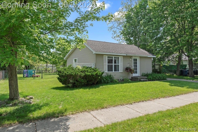501 Front St, Holly, MI 48442 - view of front facade featuring roof with shingles