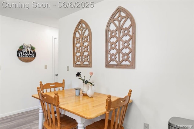 501 Front St, Holly, MI 48442 - dining space featuring wood finished floors and baseboards