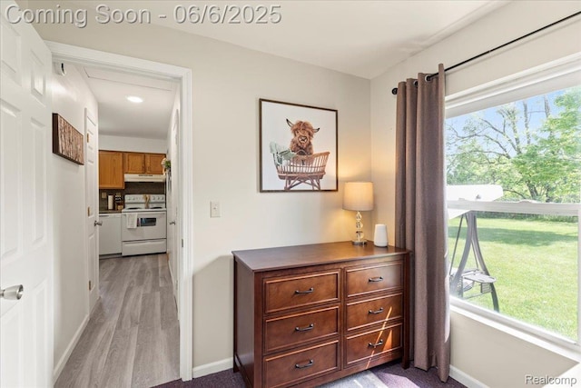 501 Front St, Holly, MI 48442 - hall featuring baseboards and light wood-style floors