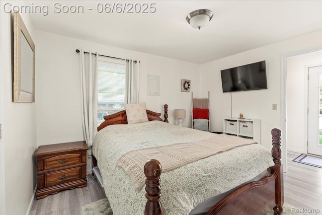 501 Front St, Holly, MI 48442 - bedroom featuring light wood finished floors and baseboards