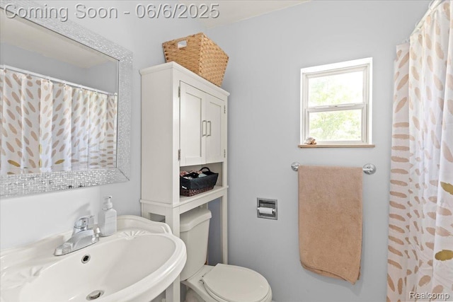 501 Front St, Holly, MI 48442 - bathroom with toilet and a sink