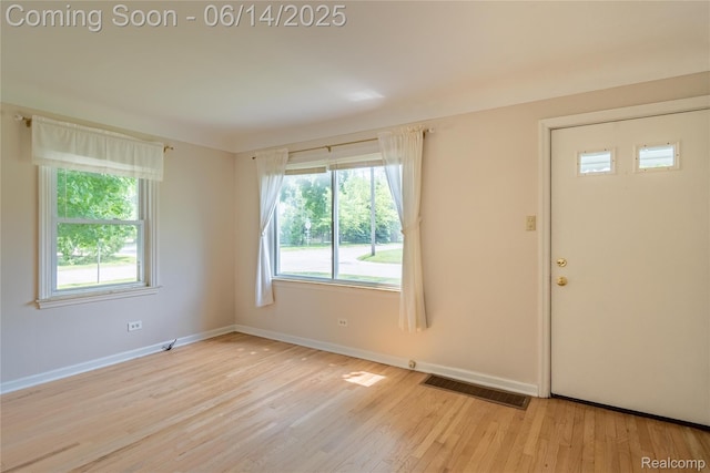 2375 Nichols Ave, Grand Blanc, MI 48507 - entrance foyer with light wood-style flooring and baseboards