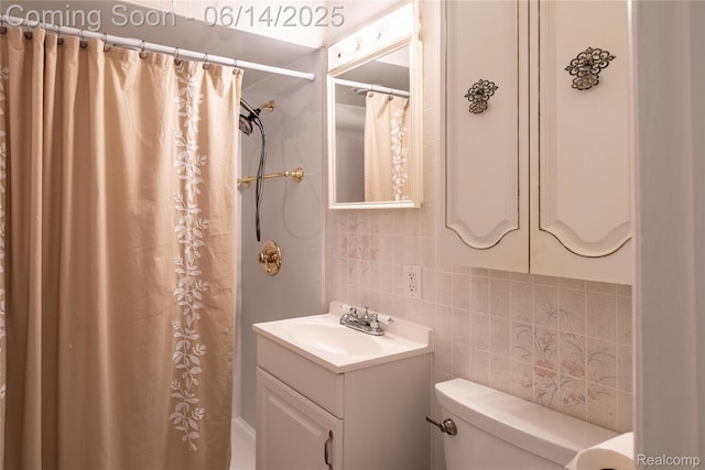 2375 Nichols Ave, Grand Blanc, MI 48507 - bathroom featuring tile walls, vanity, backsplash, and a shower with curtain