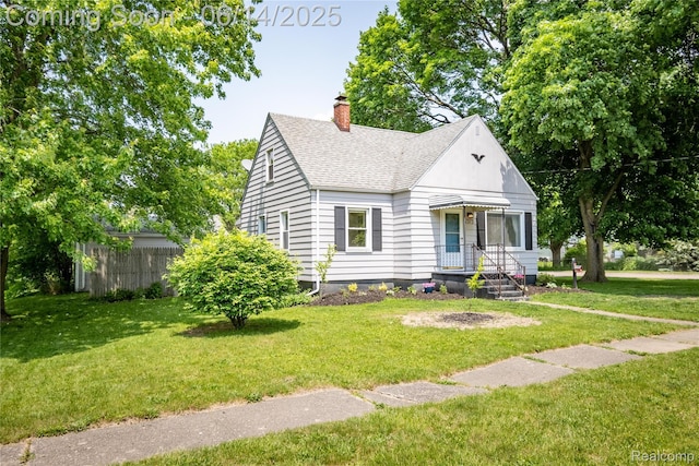 2375 Nichols Ave, Grand Blanc, MI 48507 - bungalow-style house featuring roof with shingles and a chimney
