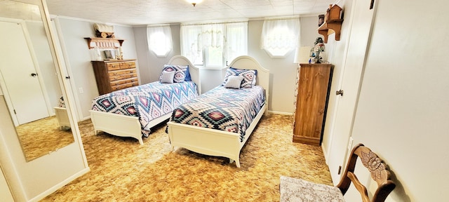 1308 Beaver Rd, Bitely, MI 49309 - bedroom with baseboards and carpet floors