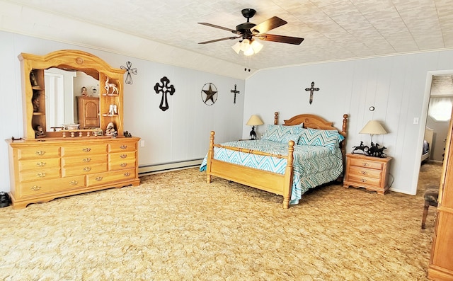 1308 Beaver Rd, Bitely, MI 49309 - bedroom with a baseboard heating unit, carpet flooring, ornamental molding, and ceiling fan