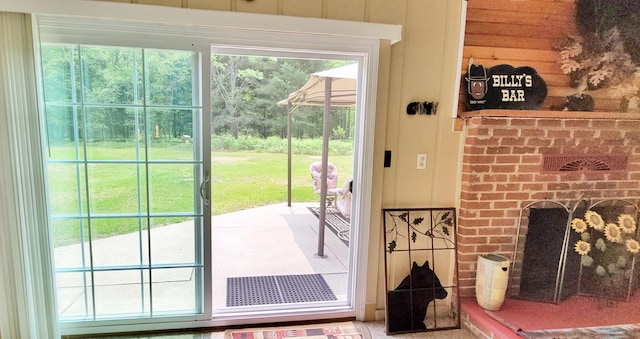 1308 Beaver Rd, Bitely, MI 49309 - entryway featuring a fireplace and plenty of natural light