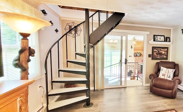 1308 Beaver Rd, Bitely, MI 49309 - stairs featuring ornamental molding and wood finished floors