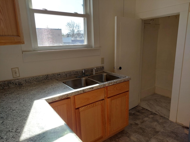 27 Rose St SW, Grand Rapids, MI 49507 - kitchen featuring a sink and light countertops