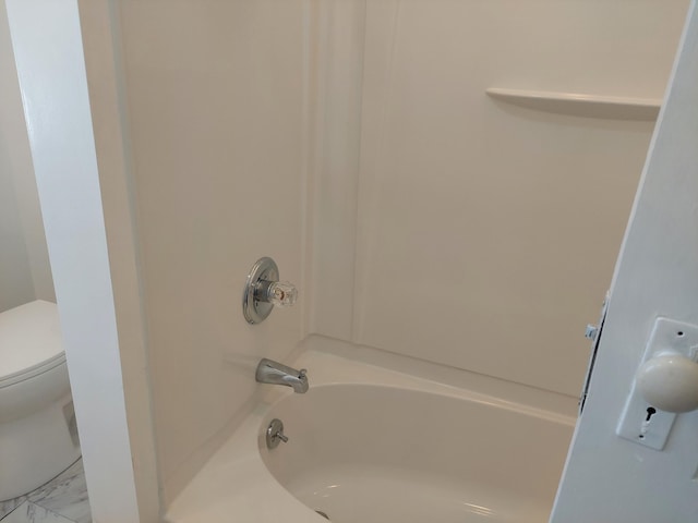 27 Rose St SW, Grand Rapids, MI 49507 - bathroom with toilet and bathtub / shower combination