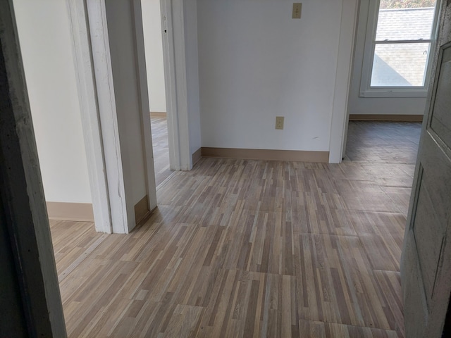 27 Rose St SW, Grand Rapids, MI 49507 - empty room featuring wood finished floors and baseboards