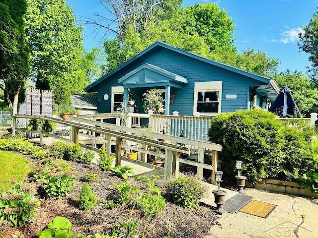 2093 California Ave, Bridgeport, MI 48601 - back of property with a deck
