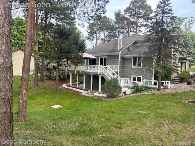 5490 Clarkston Rd, Clarkston, MI 48348 - rear view of house with a wooden deck, stairs, a shingled roof, a lawn, and a chimney