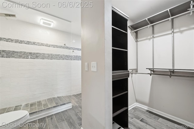 5490 Clarkston Rd, Clarkston, MI 48348 - walk in closet with wood tiled floors