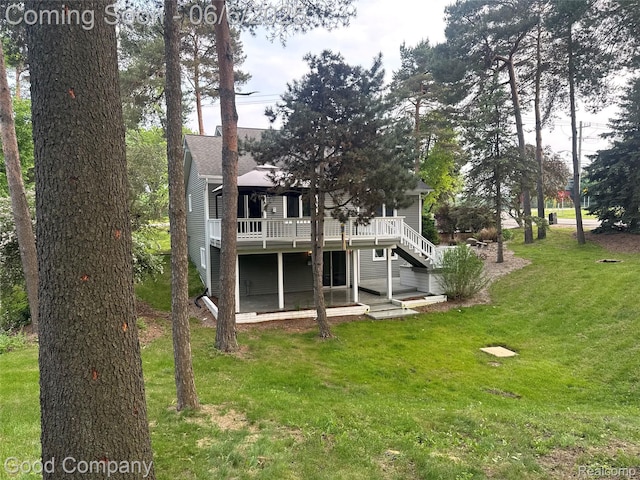 5490 Clarkston Rd, Clarkston, MI 48348 - rear view of house featuring a gazebo, a yard, and a wooden deck