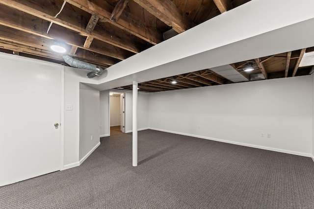 21850 Schroeder Ave, Eastpointe, MI 48021 - finished basement with dark carpet and baseboards