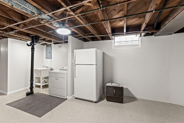 21850 Schroeder Ave, Eastpointe, MI 48021 - below grade area featuring freestanding refrigerator, washer / clothes dryer, electric panel, and a sink