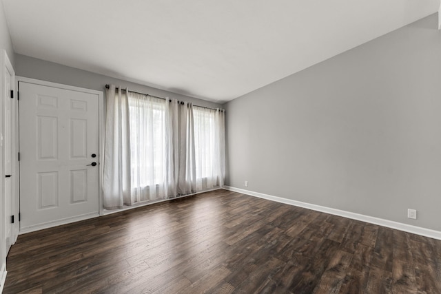 21850 Schroeder Ave, Eastpointe, MI 48021 - empty room with dark wood finished floors and baseboards