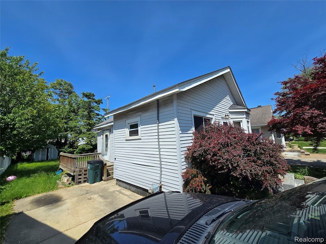 104 Charlevoix St, Clawson, MI 48017 - view of side of home featuring a patio area